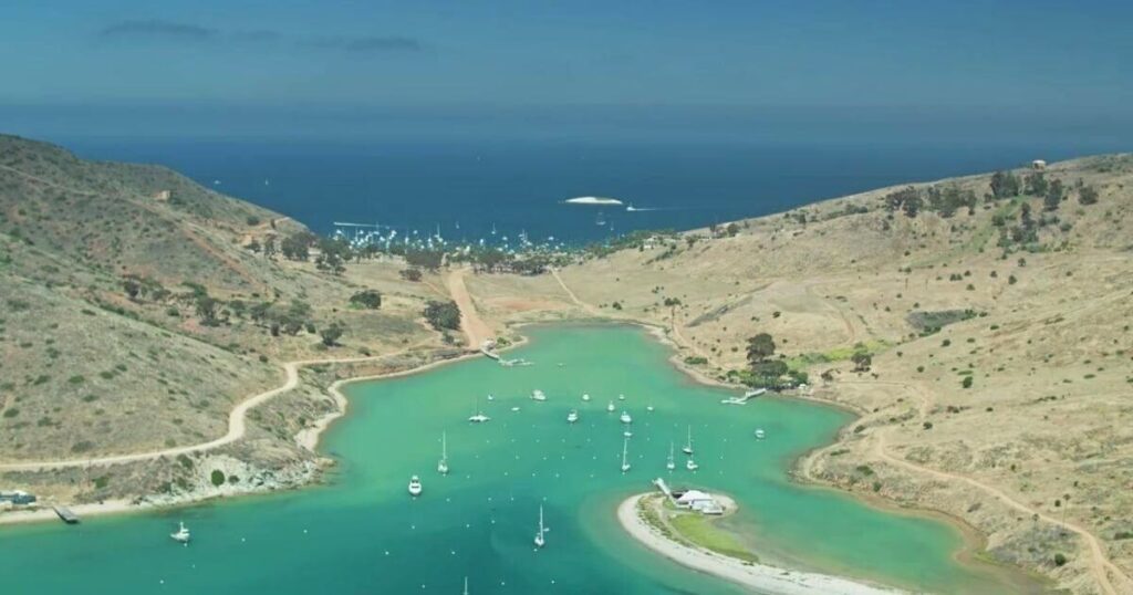 Sailboats on either side of the isthmus of Two Harbors