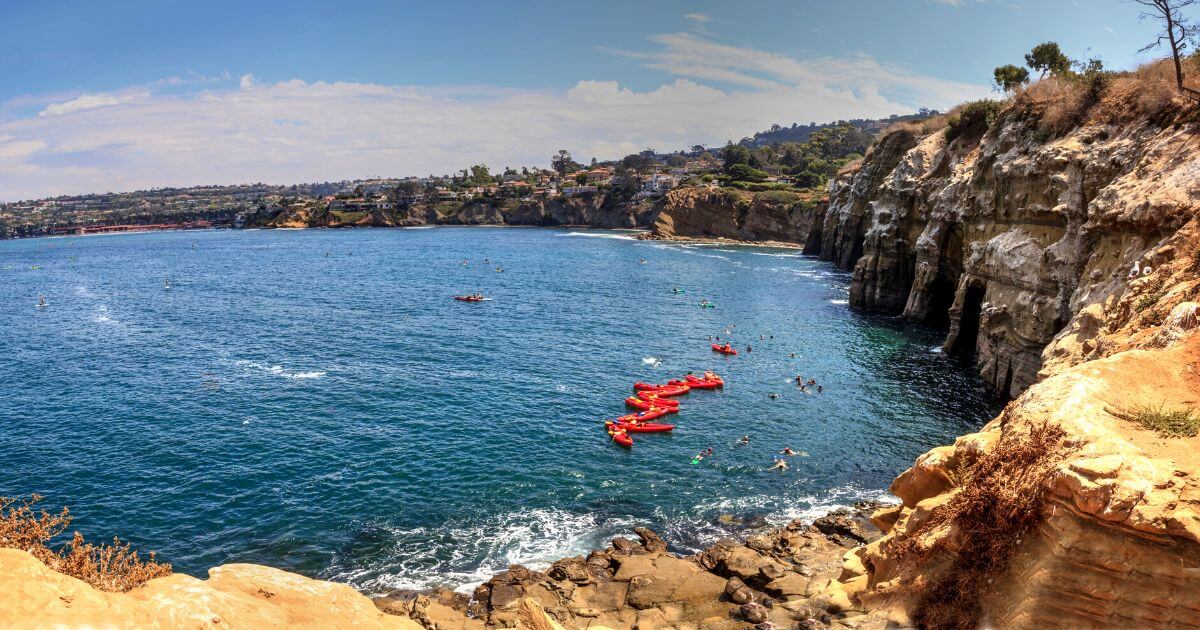 Kayaks near coastal caves at La Jolla Cove